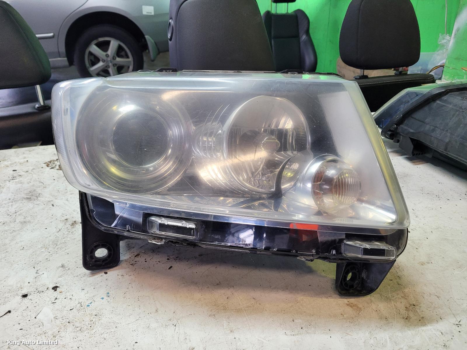 JEEP GRANDCHEROKEE 2012 Right Headlamp thumbnail 1